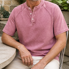 Faceless seated styling of the pink Saltwater short-sleeve Henley