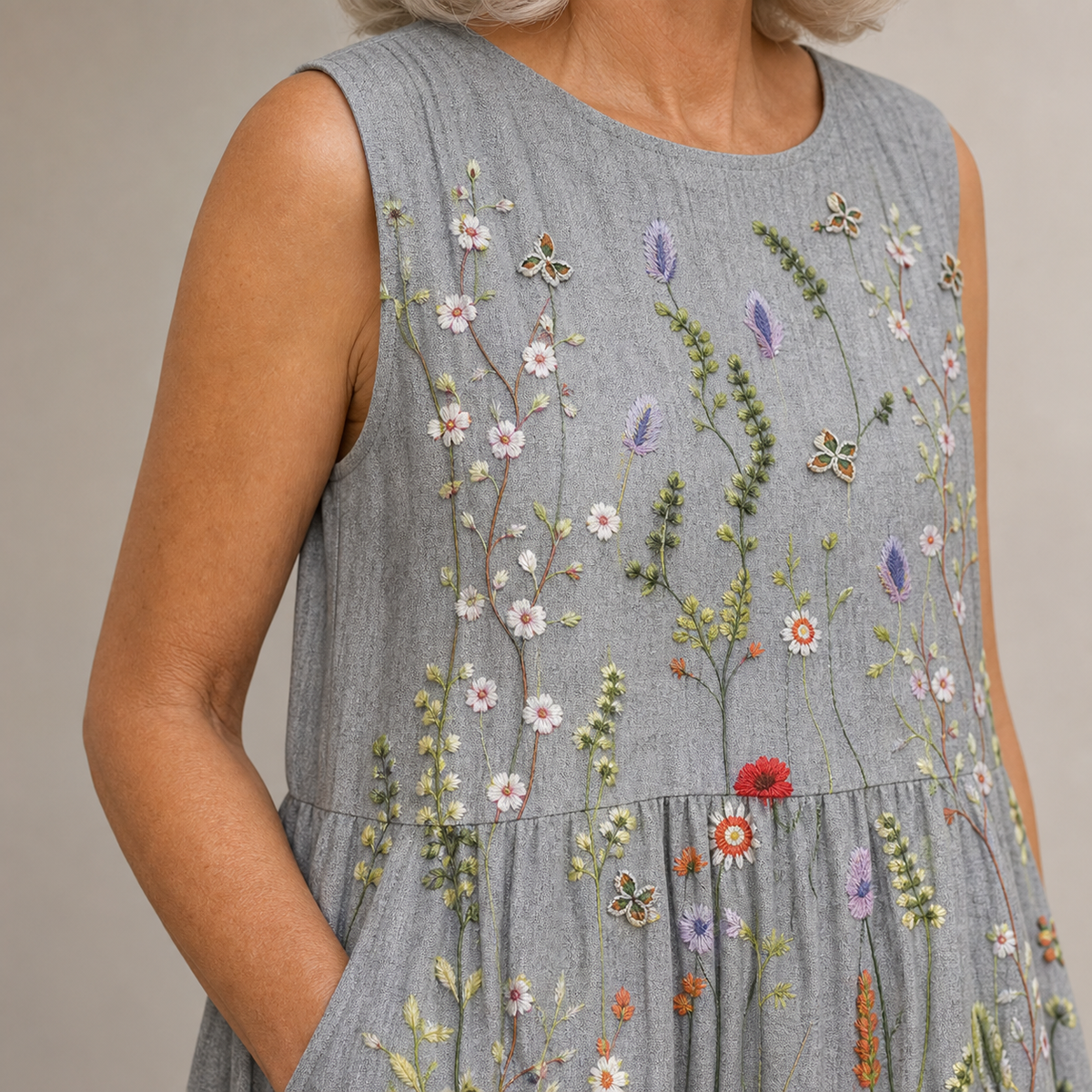 CARA — WILDFLOWER MIDI DRESS close-up showing the visible print and front construction detail