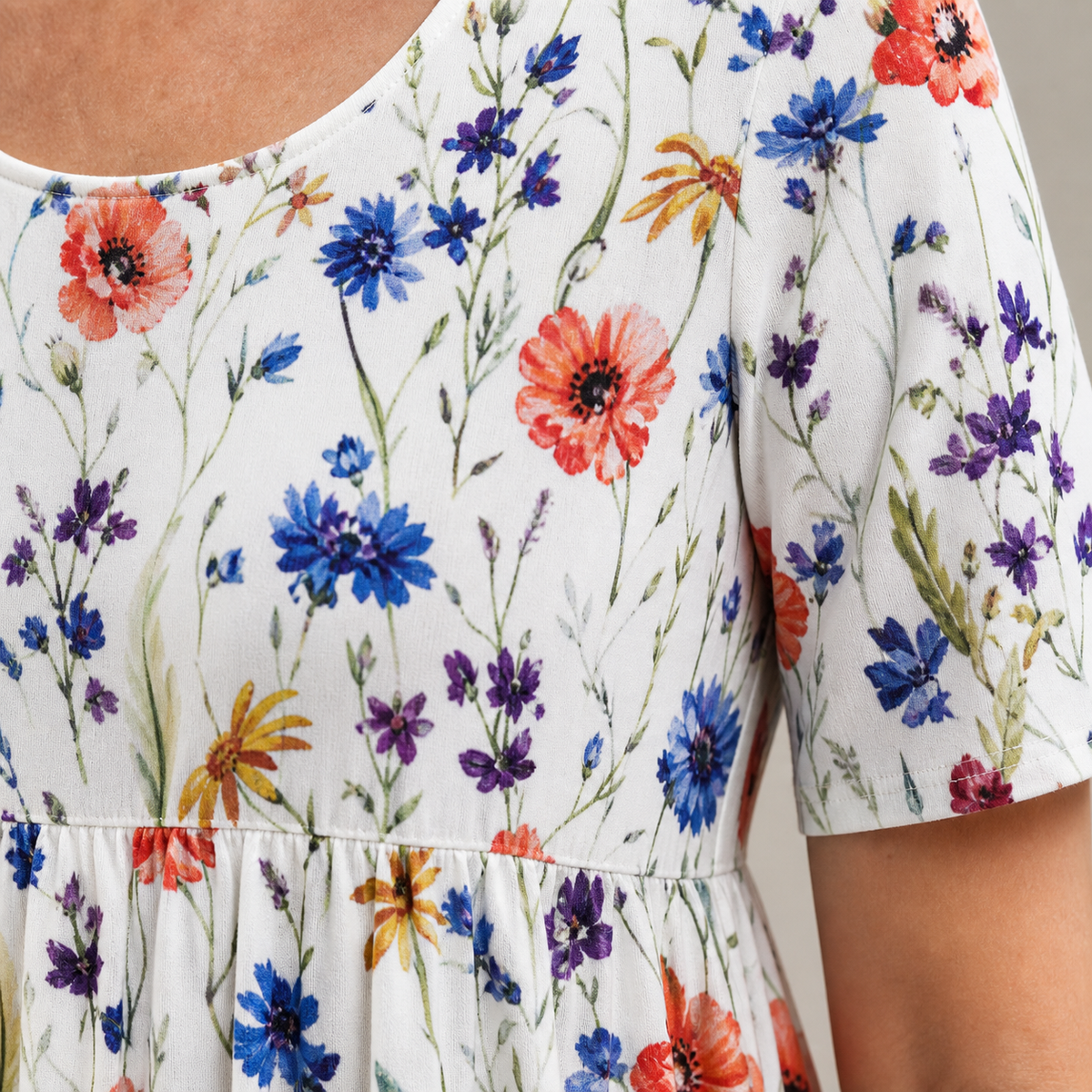 GEORGINA — ELEGANT DRESS WITH TUMMY COVERAGE close-up showing the visible print and front construction detail