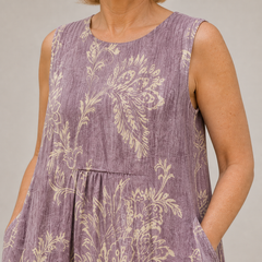 MIA — FLORAL MIDI DRESS close-up showing the visible print and front construction detail