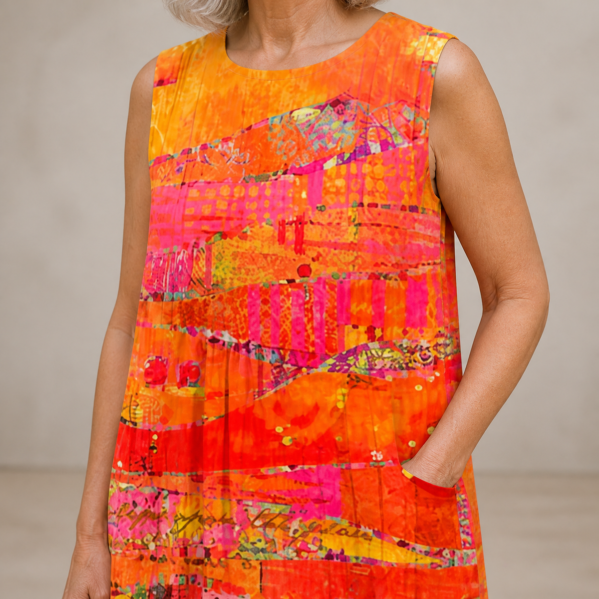 FAYE — SUNSET MIDI DRESS close-up showing the visible print and front construction detail