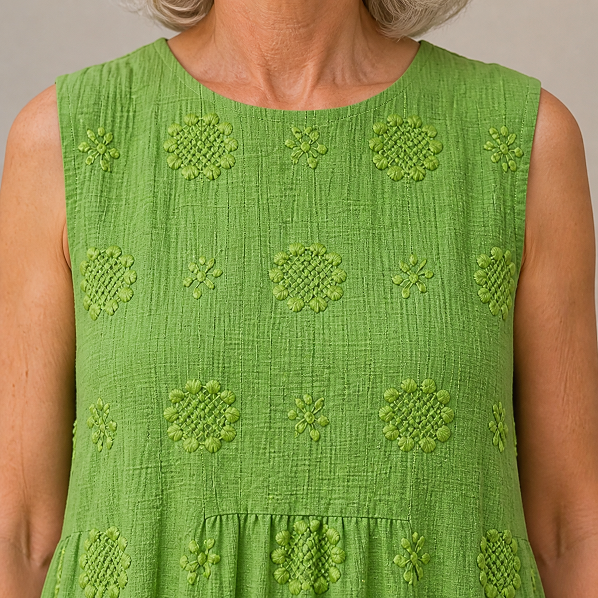 SARA — PATTERNED MIDI DRESS close-up showing the visible print and front construction detail