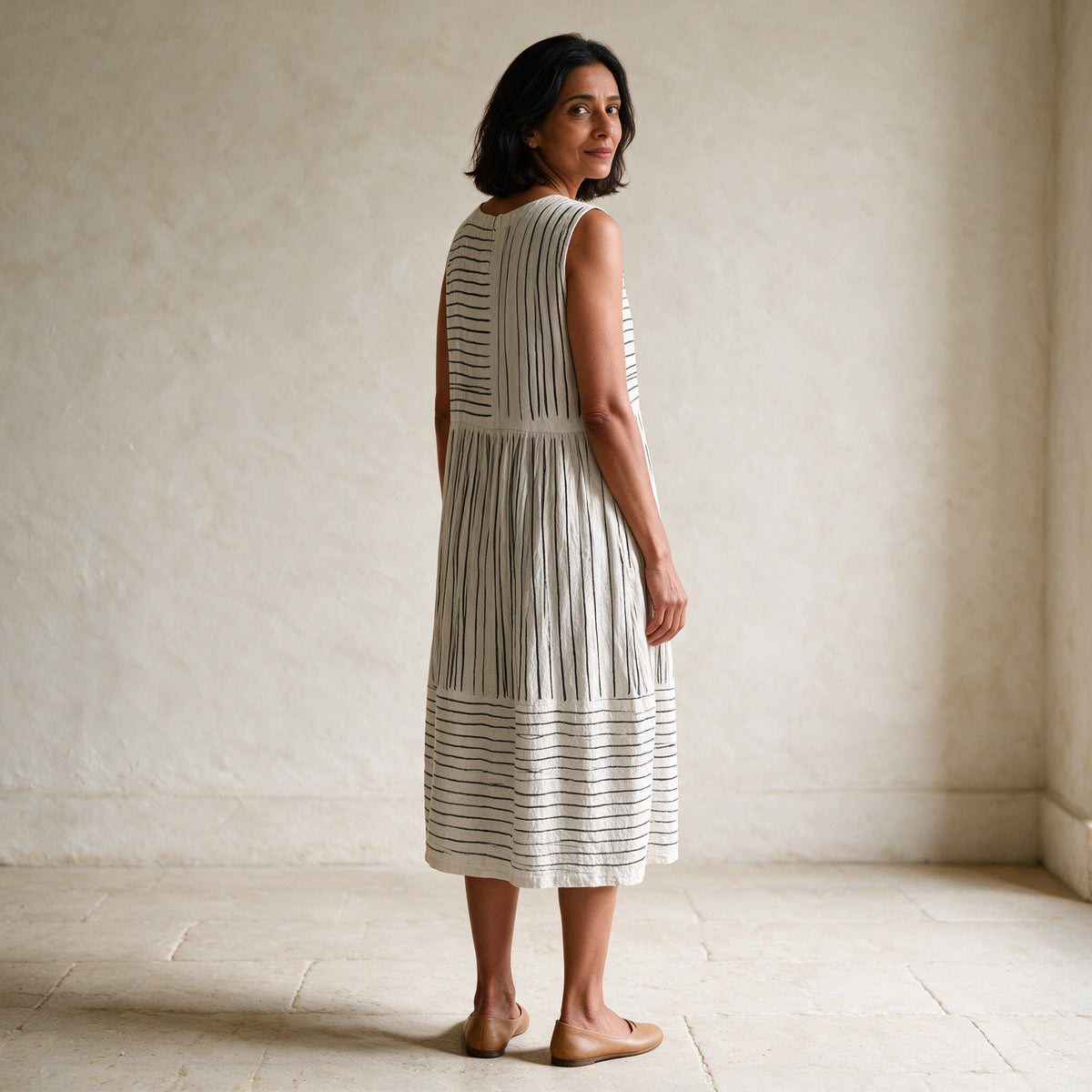 The Amara midi dress, rear three-quarter view