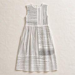 The Amara white and black line-print midi dress in a clean flat lay