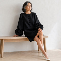 The Elowen | Floral-Cuff Mini Dress, Black — seated relaxed