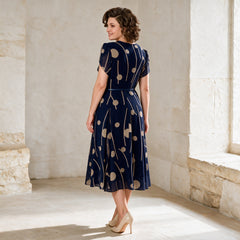 IVY navy chiffon midi dress, rear three-quarter view