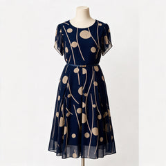 IVY navy chiffon midi dress displayed on a mannequin