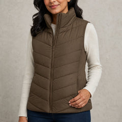 The Rowan | Quilted Gilet, Vintage Brown — zip pocket detail
