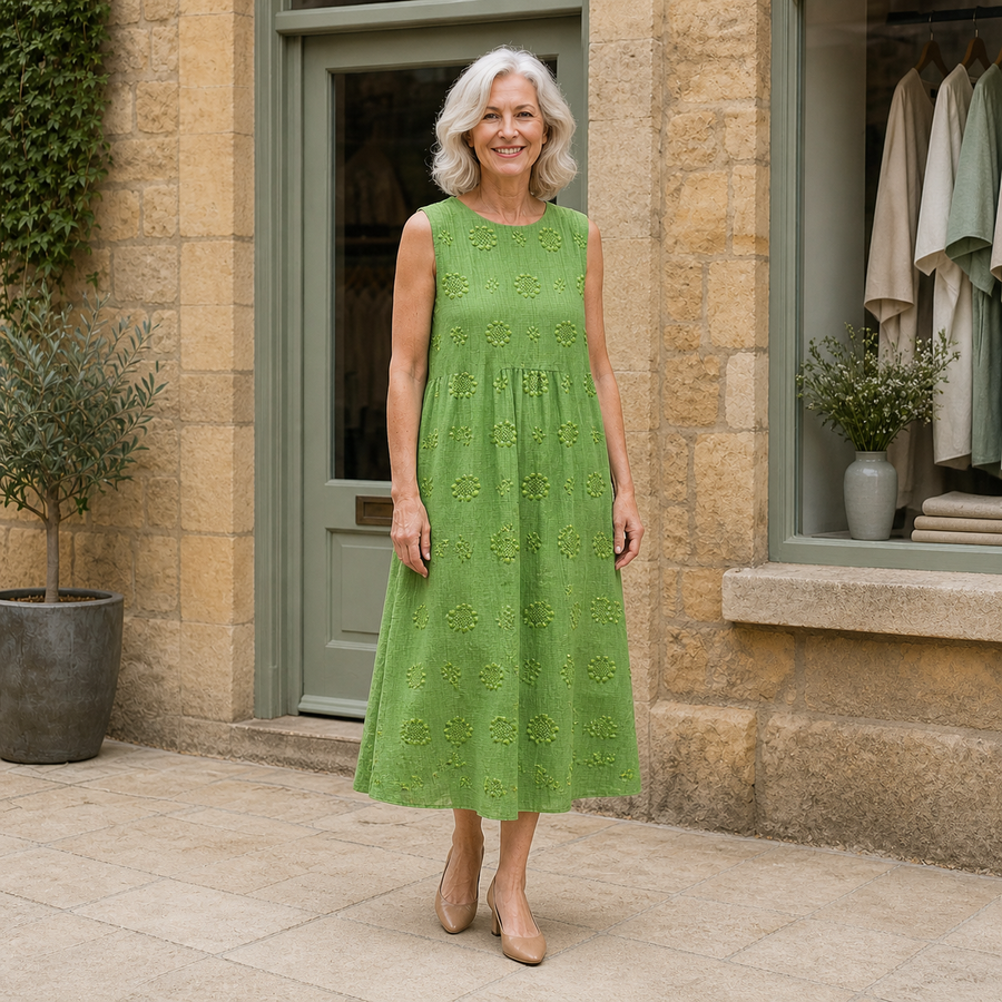 Sara midi dress in Green — full front view on Rose outside the Cotswold boutique