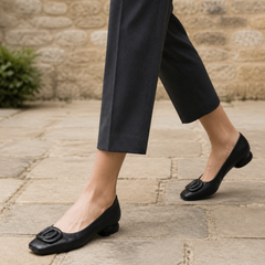 Opium black square-toe flats on a Cotswold walk