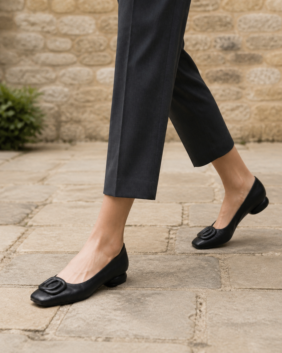 Opium black square-toe flats on a Cotswold walk