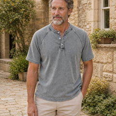 Saltwater light grey short-sleeve Henley in an autumn courtyard